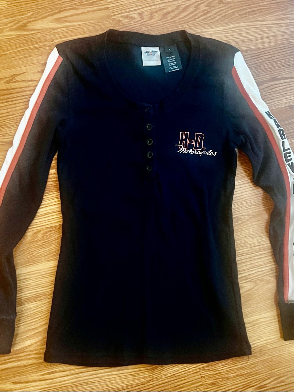 Harley-Davidson Women’s Y2K Black Long-Sleeve Henley with orange & white Stripes